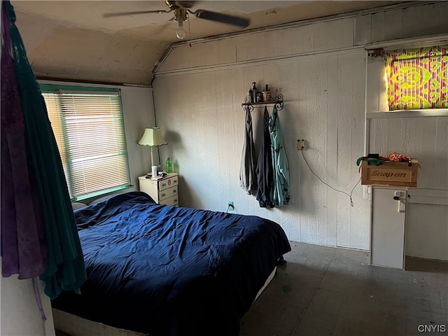 bedroom featuring ceiling fan and vaulted ceiling