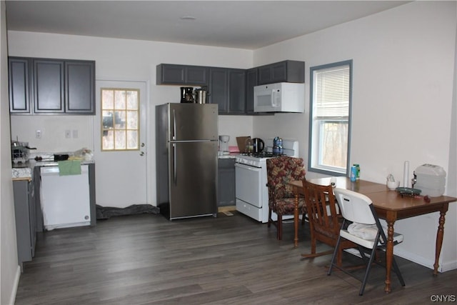 4966 State Route 31, Clay, NY 13041 - kitchen with white appliances, dark wood-type flooring, light countertops, and an office area