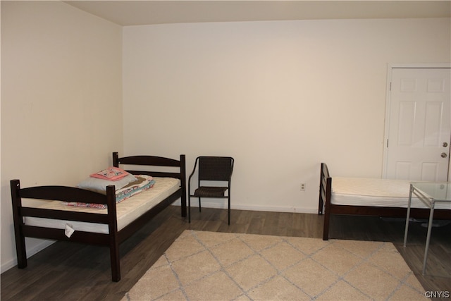 bedroom featuring hardwood / wood-style flooring