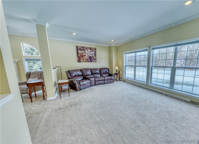 carpeted living room featuring crown molding