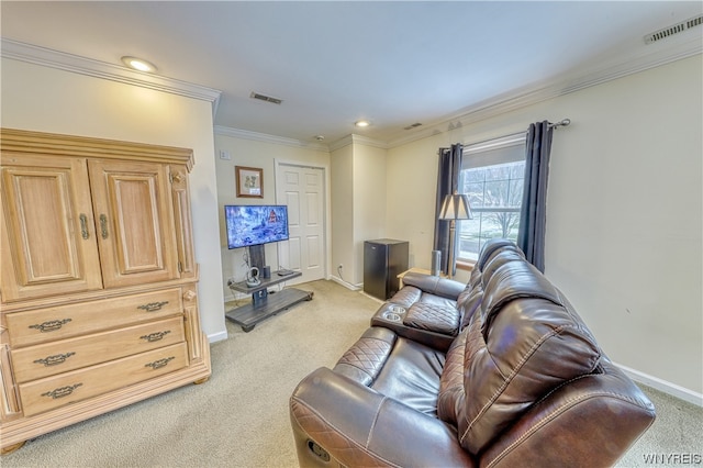 living room with ornamental molding and light carpet