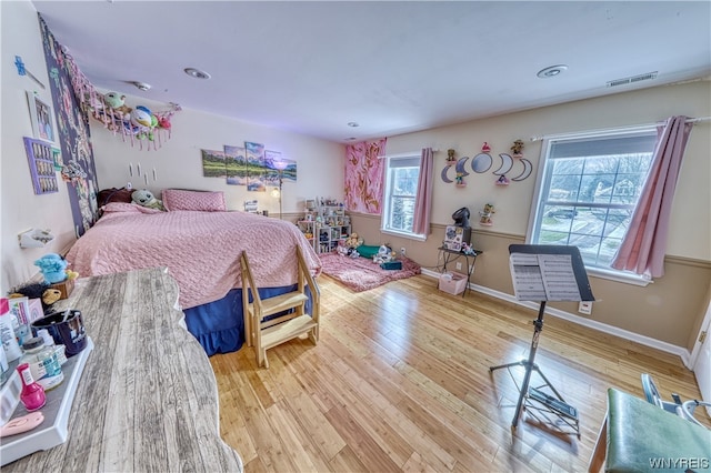 bedroom featuring light wood-type flooring