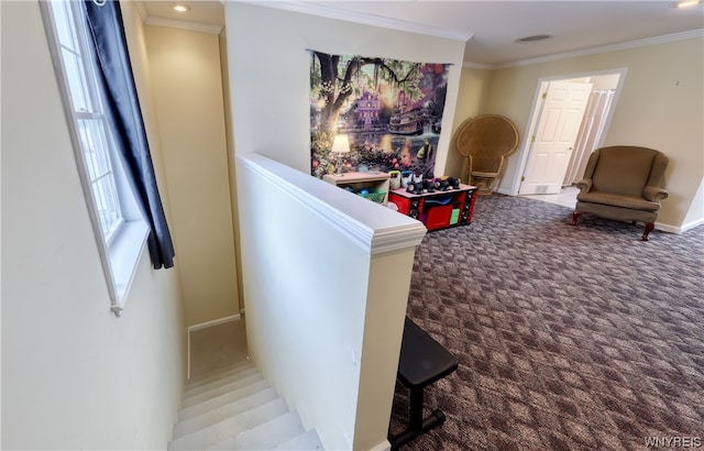 interior space featuring carpet and ornamental molding