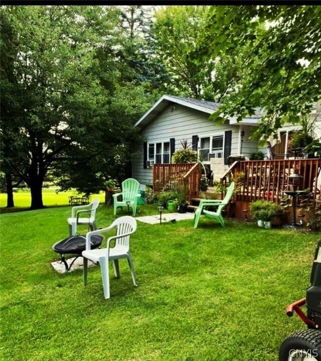 view of yard featuring a deck