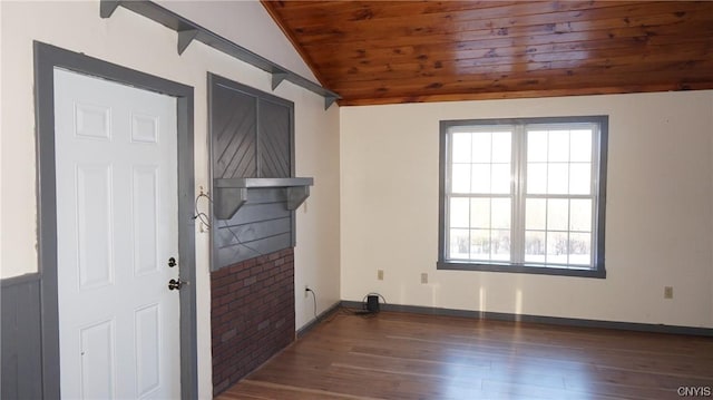 clothes washing area with plenty of natural light, wooden ceiling, and dark wood-type flooring