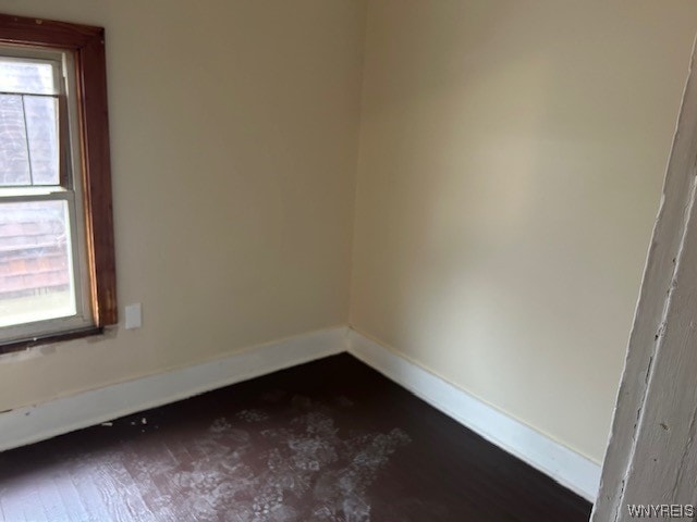 unfurnished room with a healthy amount of sunlight
