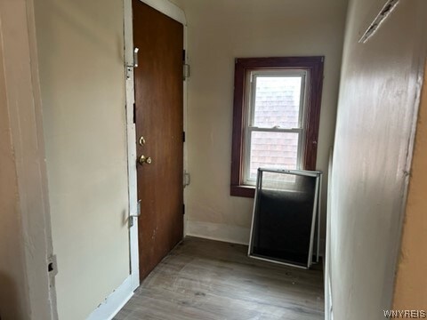 hallway featuring light hardwood / wood-style floors