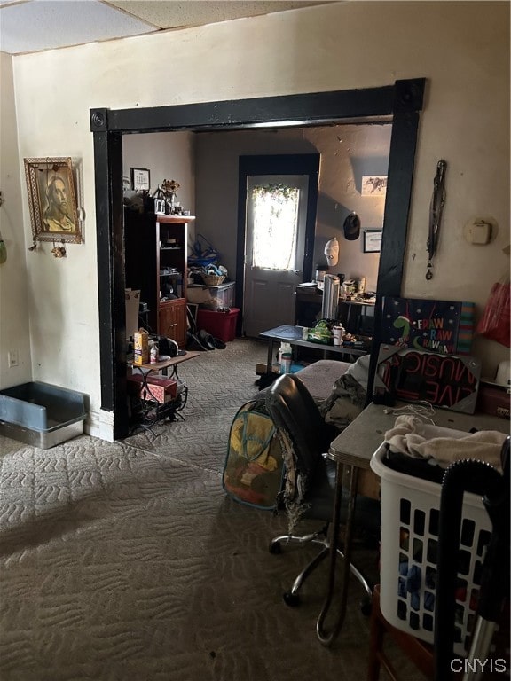 bedroom featuring dark colored carpet