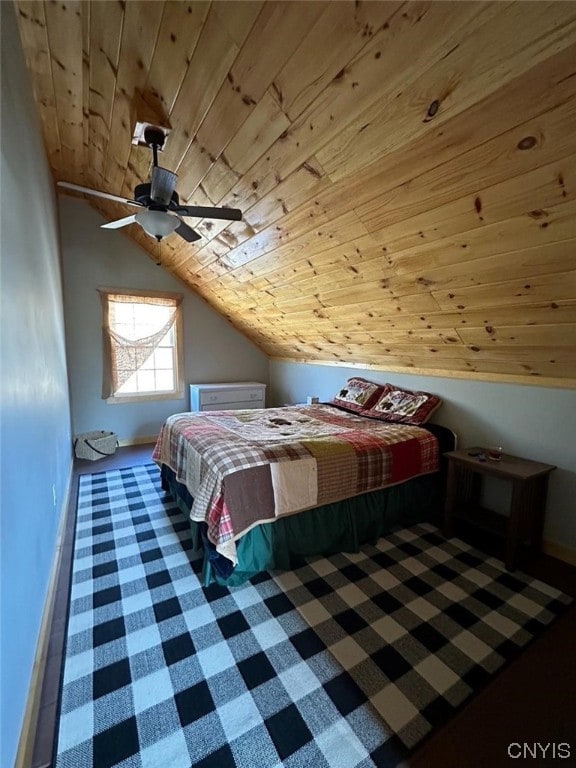 unfurnished bedroom with wood ceiling, ceiling fan, and vaulted ceiling