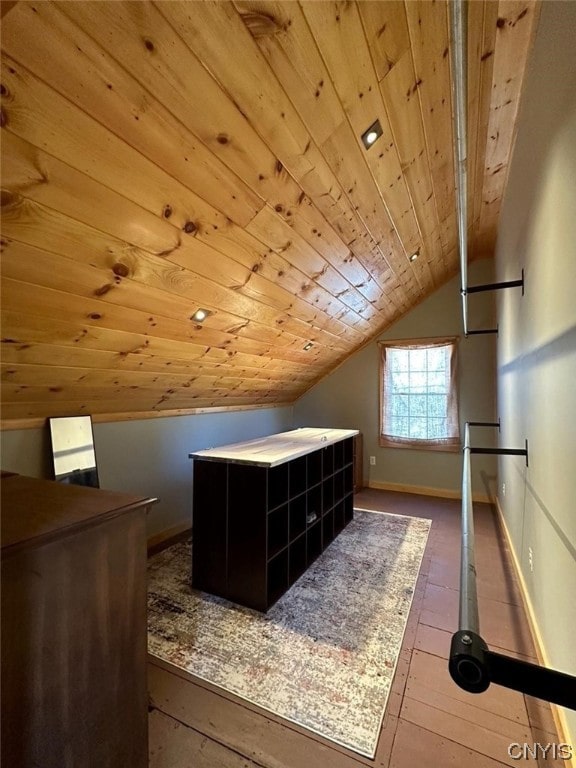 bonus room with vaulted ceiling, dark hardwood / wood-style flooring, and wood ceiling