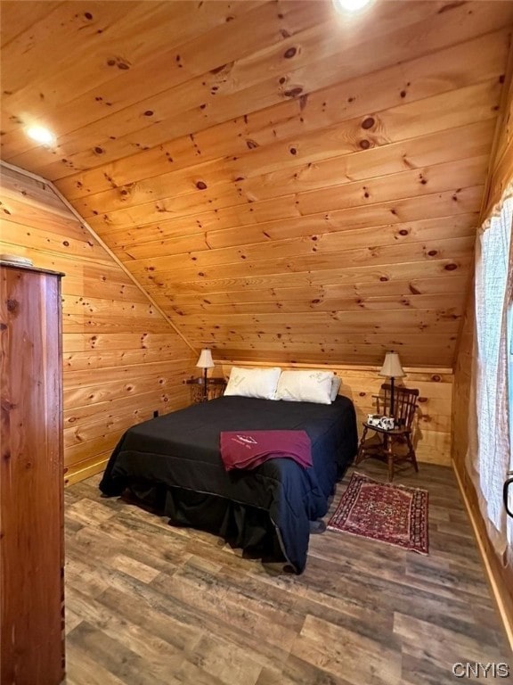 bedroom with wooden ceiling, wood walls, dark hardwood / wood-style flooring, and vaulted ceiling