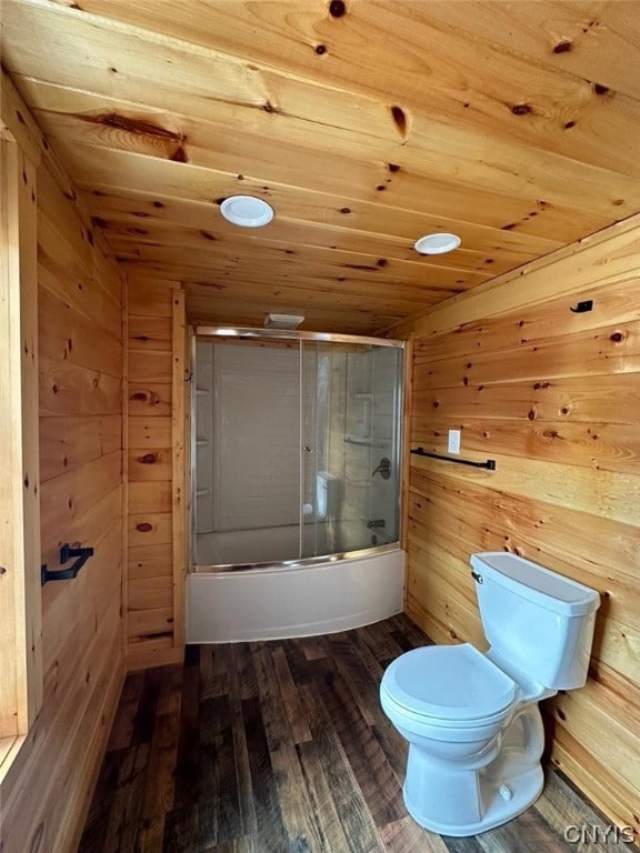 bathroom with wooden ceiling, wood-type flooring, wooden walls, and toilet