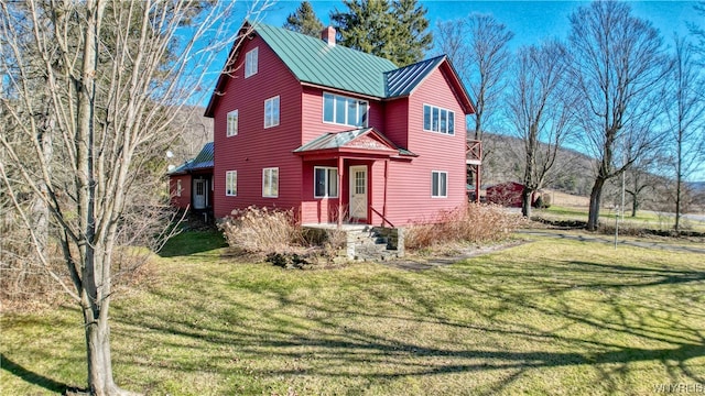 view of front property with a front lawn