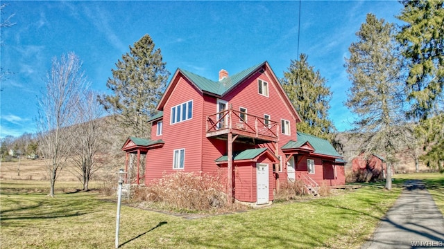 view of home's exterior with a lawn