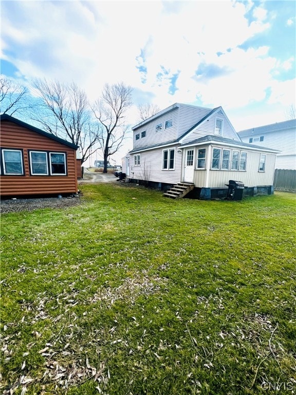 exterior space featuring a lawn