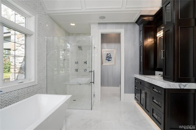 bathroom with oversized vanity, shower with separate bathtub, and tile flooring