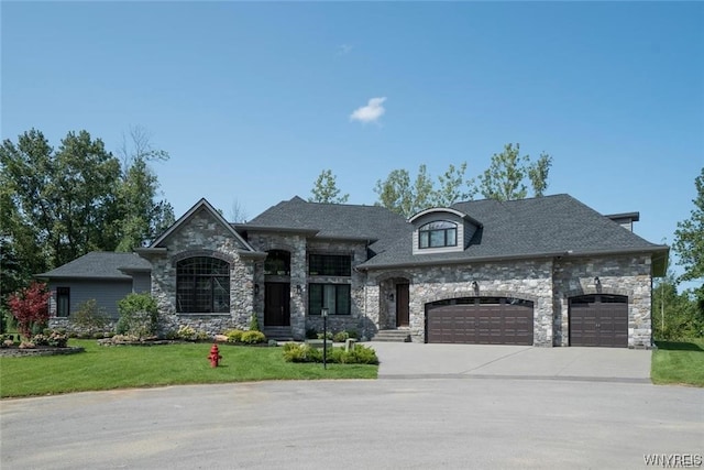 french country inspired facade with a front lawn