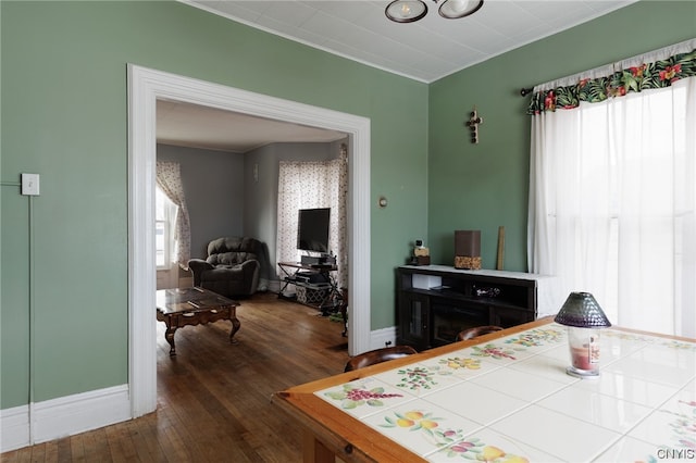 bedroom with dark wood-type flooring