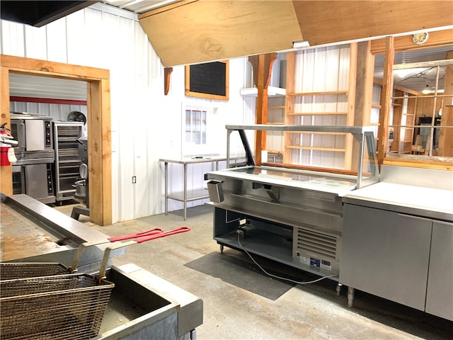 interior space featuring concrete flooring