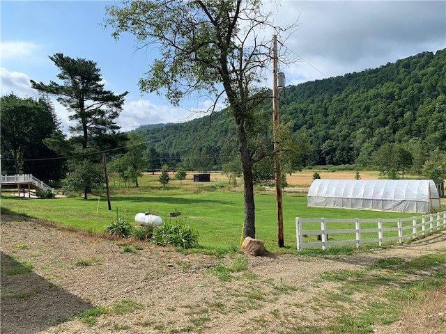 view of mountain feature featuring a rural view