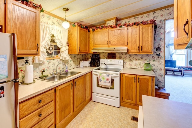 kitchen featuring ornamental molding, a textured ceiling, sink, pendant lighting, and electric range