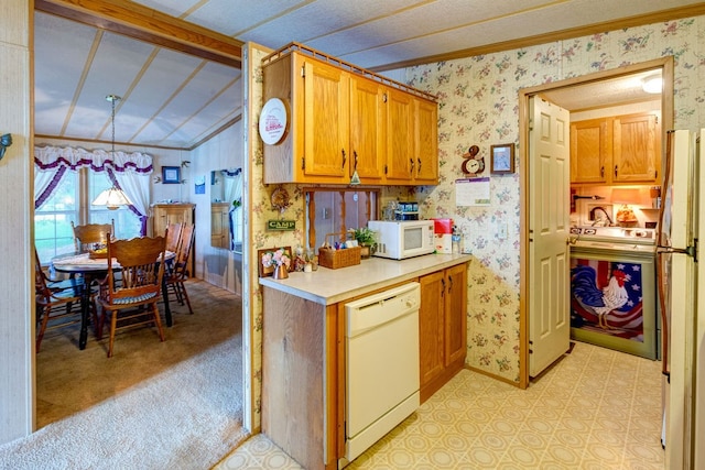 kitchen with white appliances, light colored carpet, vaulted ceiling, crown molding, and decorative light fixtures