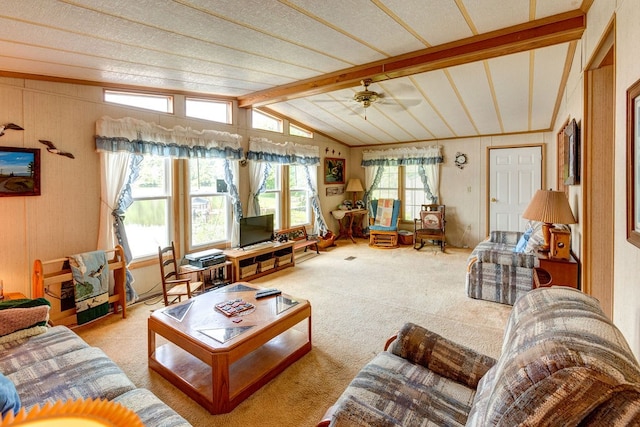 carpeted living room featuring lofted ceiling with beams and ceiling fan