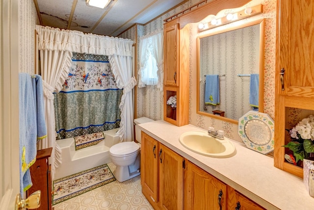 full bathroom with shower / tub combo, vanity, a textured ceiling, and toilet