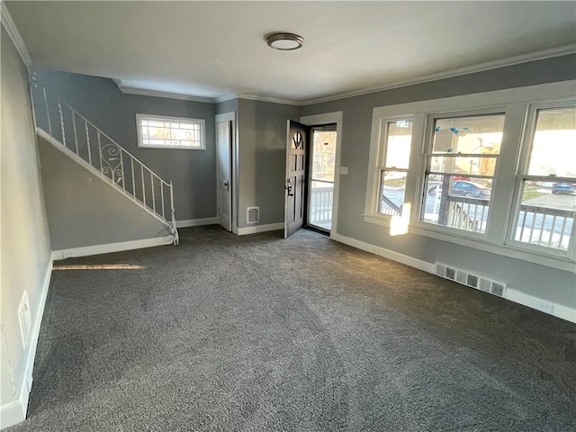 interior space with crown molding and plenty of natural light