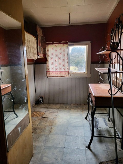 interior space featuring light tile flooring