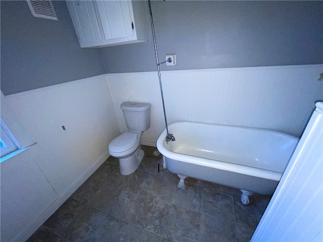 bathroom with a bathtub and toilet