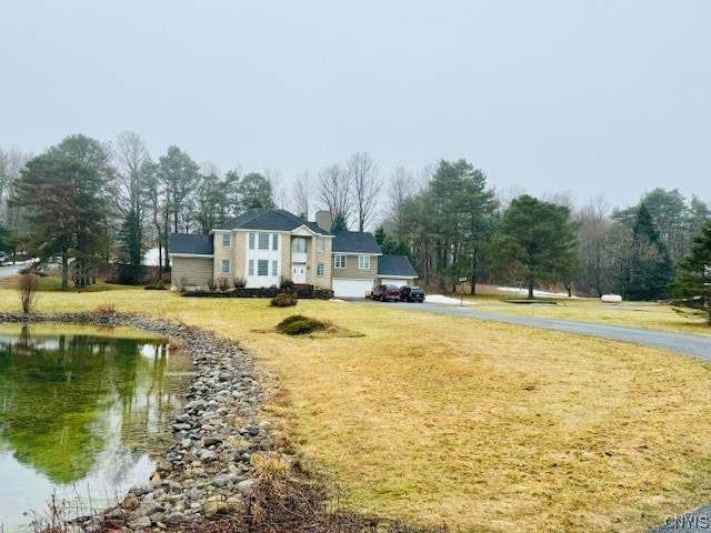 view of yard with a water view