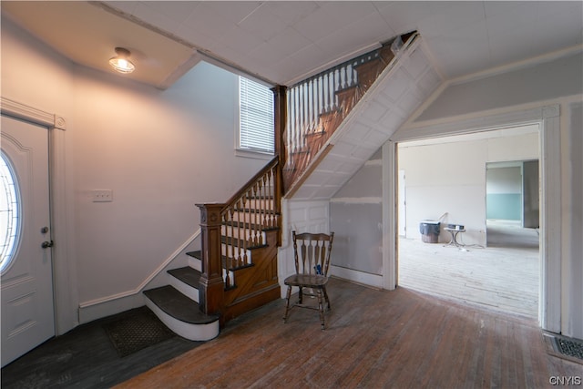 foyer entrance with dark hardwood / wood-style flooring