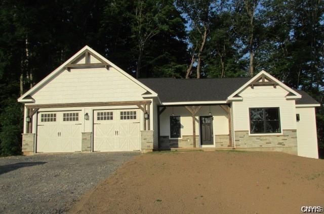 craftsman-style home with a garage