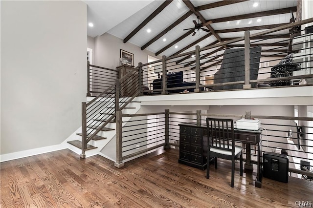 interior space with ceiling fan, wood-type flooring, beamed ceiling, and high vaulted ceiling