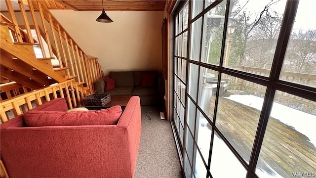 sunroom / solarium featuring wooden ceiling