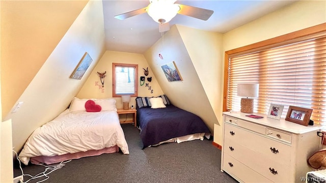 bedroom featuring ceiling fan, lofted ceiling, and carpet flooring