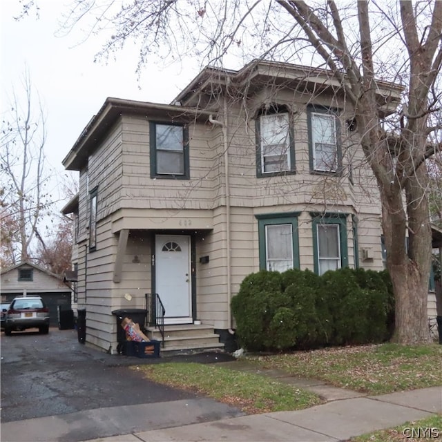 view of front of property featuring a garage