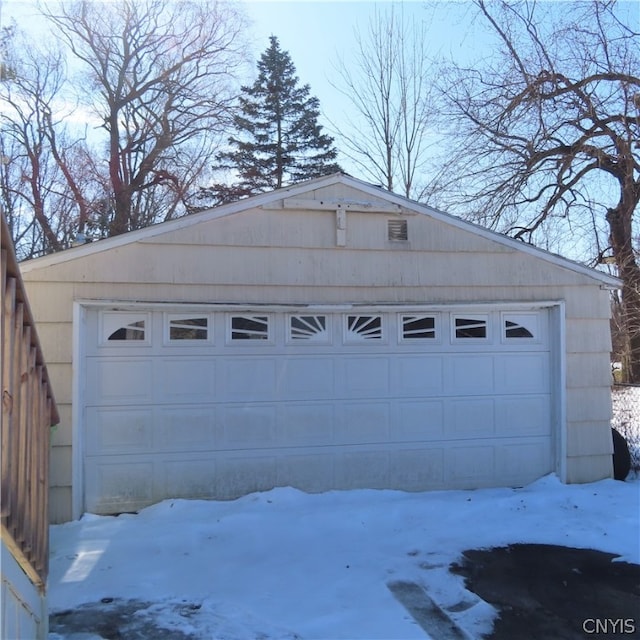 view of snow covered garage