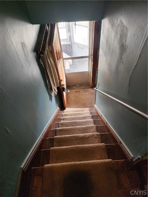 stairs with dark carpet