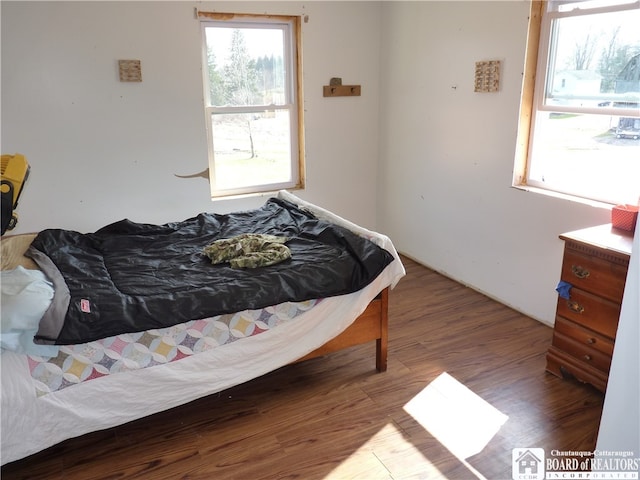 bedroom featuring hardwood / wood-style floors