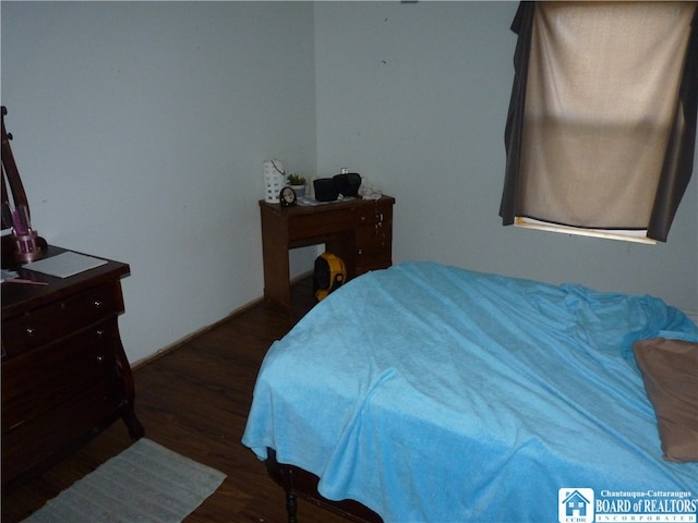 bedroom featuring dark hardwood / wood-style floors