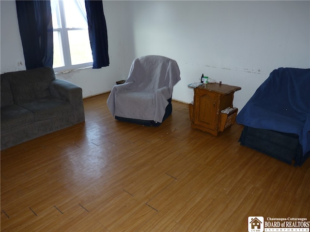 living room with dark wood-type flooring