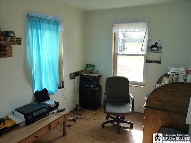 home office featuring light hardwood / wood-style flooring