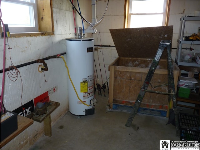 utility room with water heater