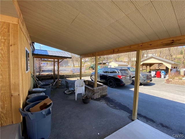 view of patio featuring a carport