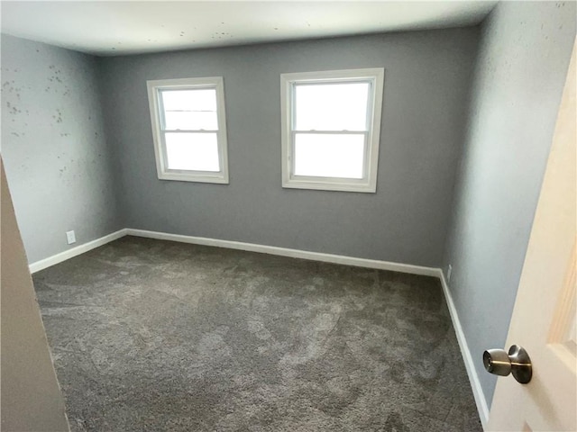 2125 Transit Rd, Elma, NY 14059 - spare room with dark carpet and baseboards