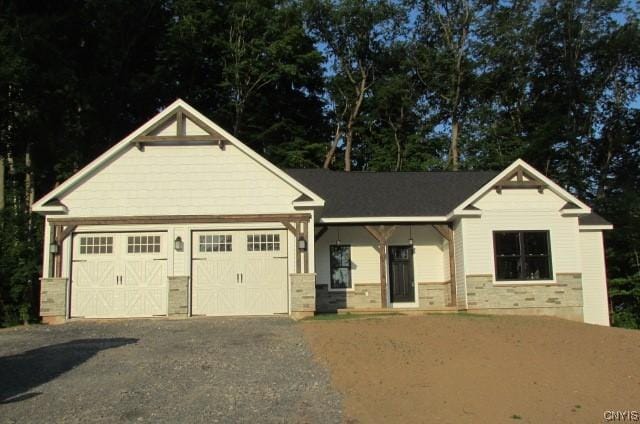 craftsman inspired home featuring a garage