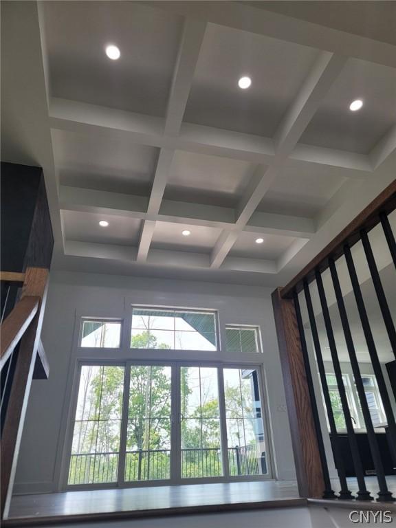 room details featuring beam ceiling and coffered ceiling