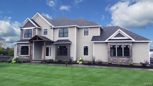 craftsman house with a front yard